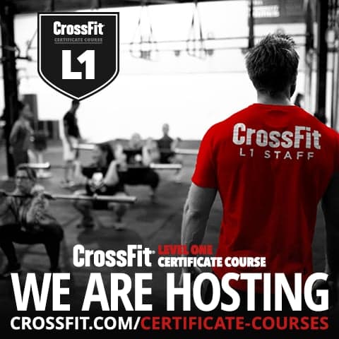 CrossFit Level 1 Certificate Course: we are hosting, with a coach in an L1 Staff shirt overseeing a class